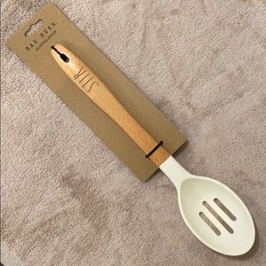 Rae Dunn slotted spoon. “STIR.”